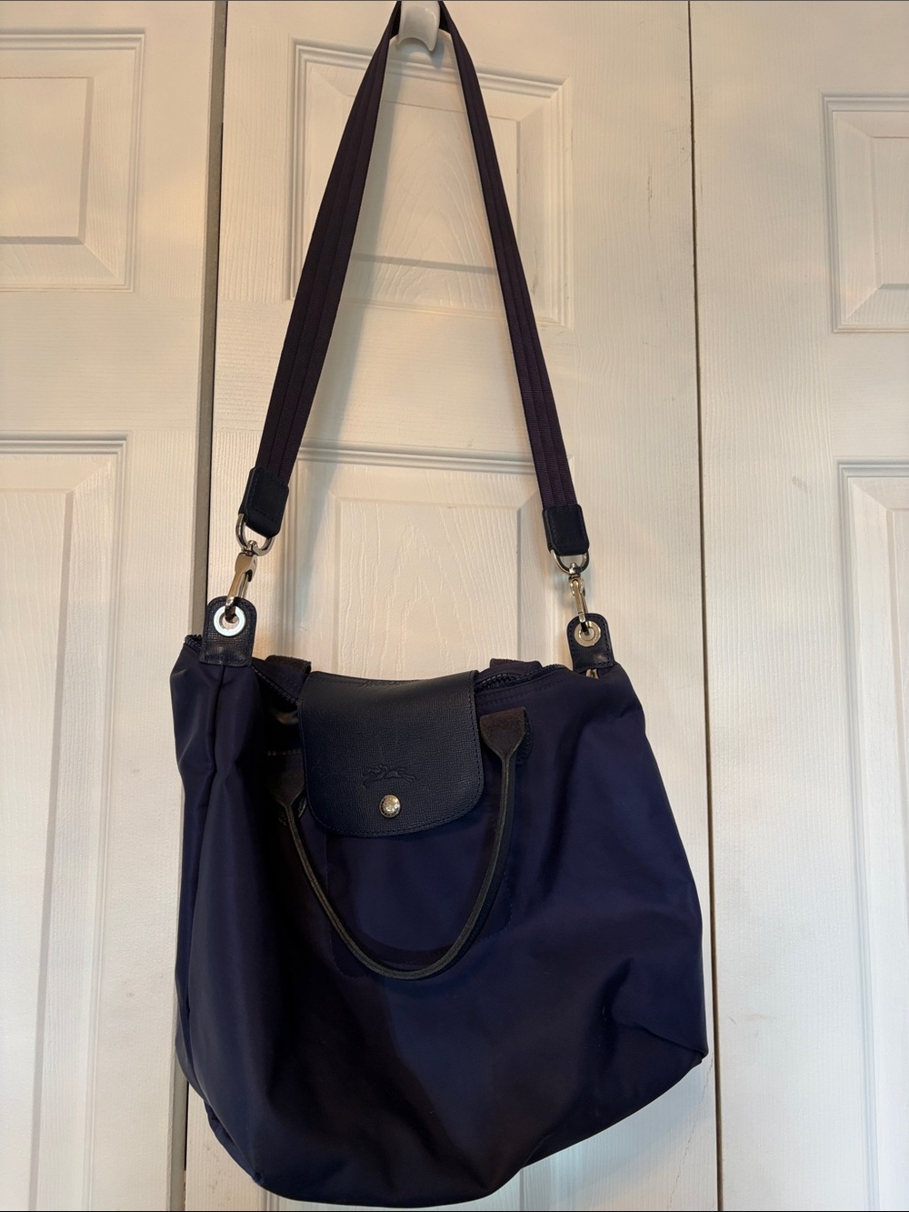 Longchamp Navy Blue Le Pliage with detachable shoulder strap.